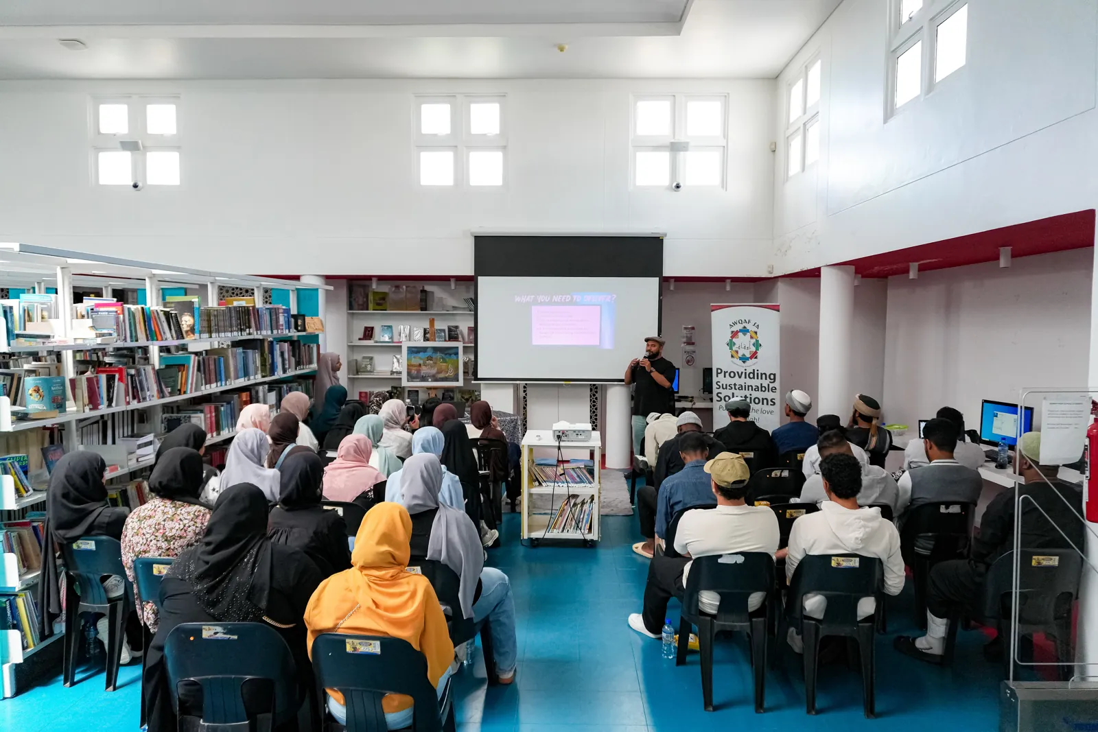 Khaalid presenting to a packed audience in the Islamia Academia Library